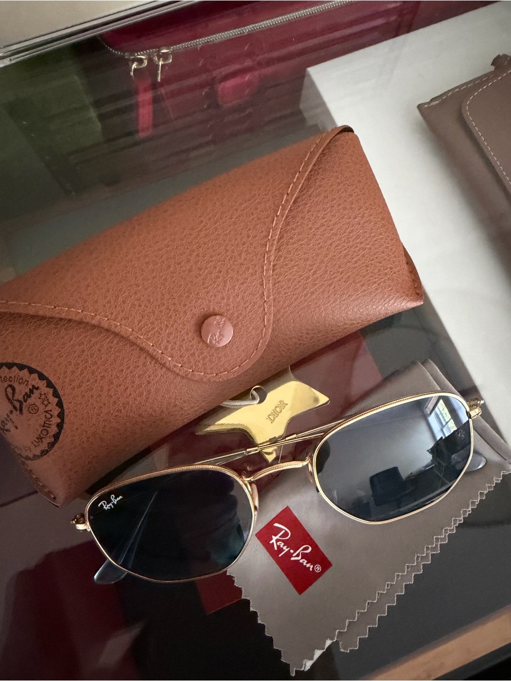 Ray-Ban Women’s Gold Frame Sunglasses with blue Lenses